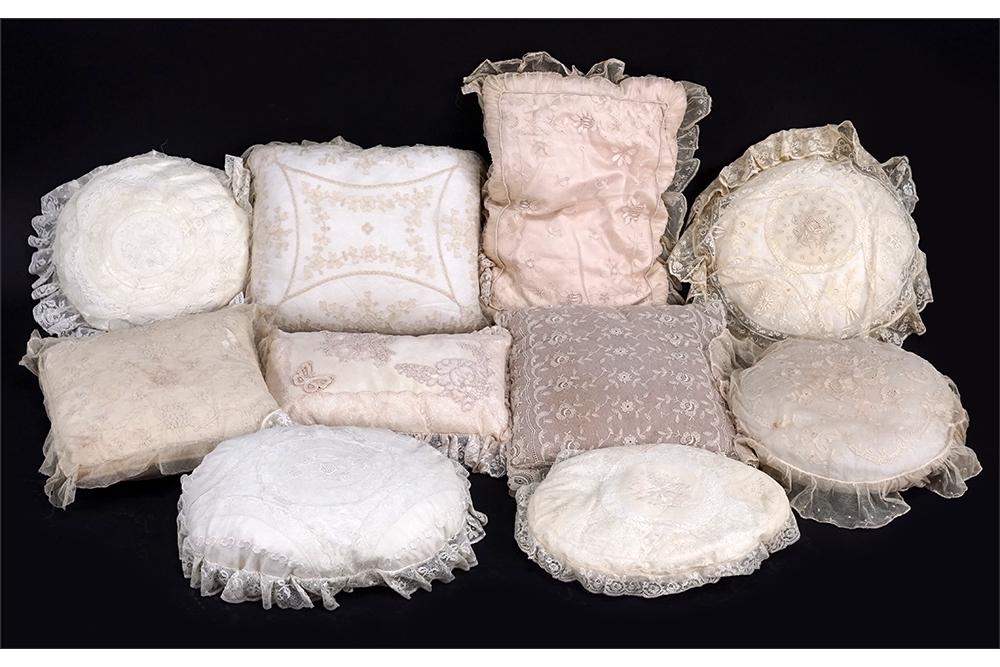 A Group of Ten Antique Lace Pillow Cases.: A Group of Ten Antique Lace Pillow Cases. Consisting of a group of ten antique lace pillow cases on decorative pillows Average: 12" x 12"