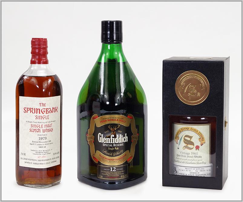 Three Unopened Bottles of Scotch Whiskey.: Three Unopened Bottles of Scotch Whiskey. Comprising a Dumbarton 1961 Signatory Vintage scotch in box, a bottle of Springbank 1979 single malt scotch whisky, and a bottle of Glenfiddich 12 year old si