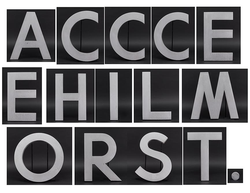 A Collection of Wall Mount Aluminum Letters.: A Collection of Wall Mount Aluminum Letters. Comprising three C's, two E's and one of the following letters; H, T, A, L, R, S, O, I, W or M Average height: 18"