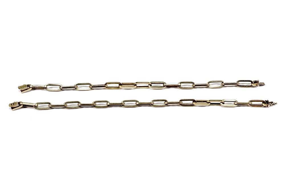 Two 14 Karat Yellow Gold Link Bracelets.: Two 14 Karat Yellow Gold Link Bracelets. Both are oval link bracelets which can be connected for use as a necklace Width: 1/4" Shorter length: 8 1/4" Longer length: 8 3/4" Wt of both: 19.8 grams