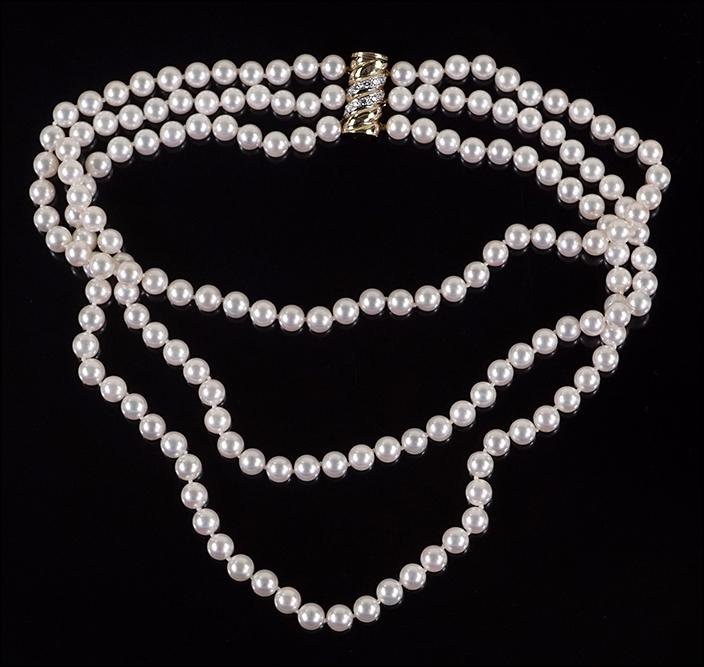 A Pearl and Diamond Necklace. (1 of 1)