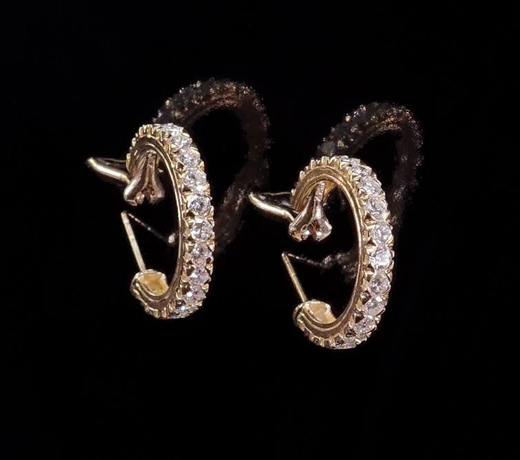 A Pair of Diamond Hoop Earrings. (1 of 1)