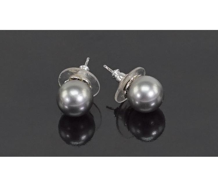 A Pair of Tahitian Pearl Stud Earrings.: A Pair of Tahitian Pearl Stud Earrings. 14 karat white gold post mountings with one grey/black Tahitian pearl which measures approximately 10mm Wt: 3.7 grams