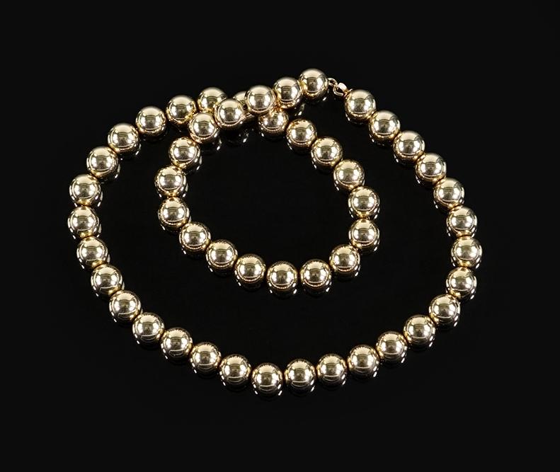 A 14 Karat Yellow Gold Bead Necklace. (1 of 1)