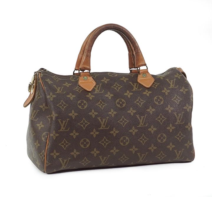 A Louis Vuitton French Company Speedy Handbag. (1 of 1)