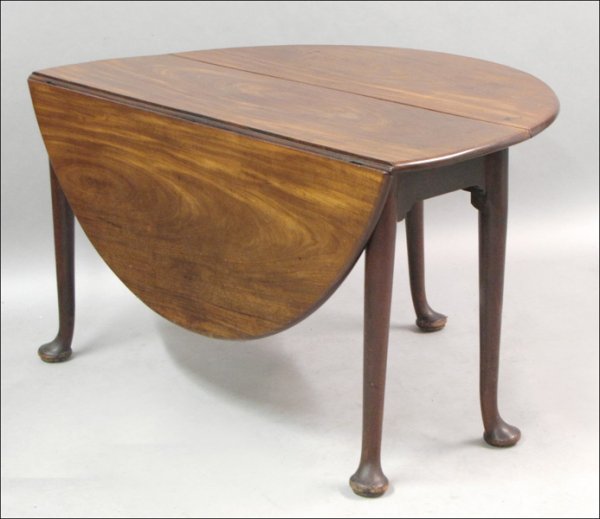 GEORGE III IRISH MAHOGANY DROP LEAF TABLE.