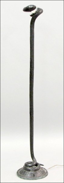 PATINATED METAL SNAKE FLOOR LAMP.: PATINATED METAL SNAKE FLOOR LAMP. In the style of Edgar Brandt Height: 60.5"
