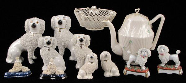 FOUR PAIRS OF STAFFORDSHIRE POTTERY DOGS.: FOUR PAIRS OF STAFFORDSHIRE POTTERY DOGS. Together with one Belleek coffeepot, one Belleek parian basket, and two German porcelain dogs