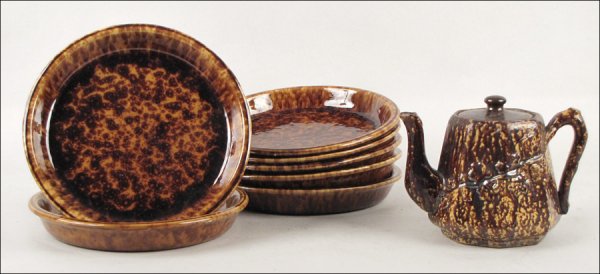 SET OF SEVEN BENNINGTON STYLE GLAZED STONEWARE 