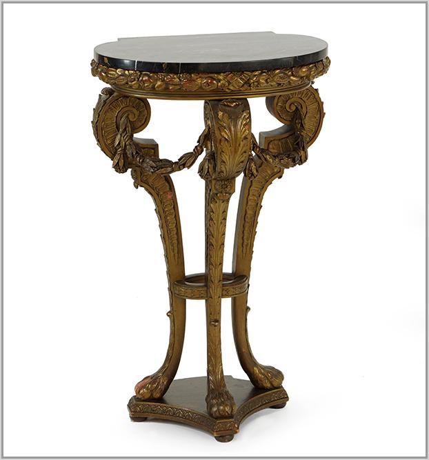 A Louis XVI Style Table.: A Louis XVI Style Table. Giltwood table raised on three hairy paw feet with organic swags between. With a marble top 35 1/2" x 21 1/2" x 16"