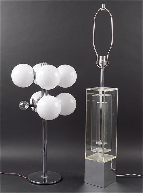 Two Table Lamps.: Two Table Lamps. Comprising a chrome and eight-light lamp in the style of Lightolier (lacking one globe shade) and a lucite and chrome table lamp (height to socket: 27") Eight-light lamp height: 26 1/