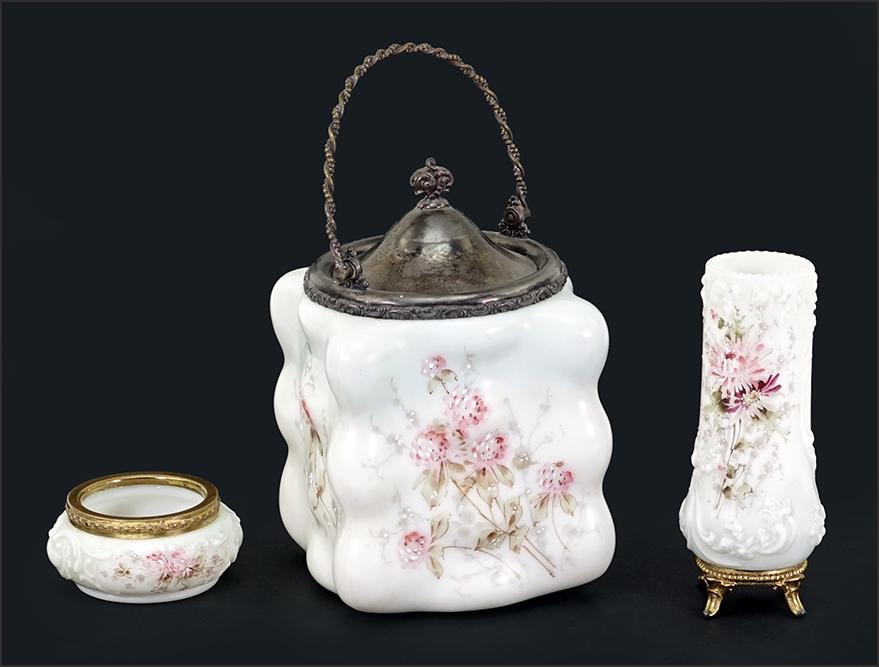 A Collection of Three Wavecrest Victorian Glass: A Collection of Three Wavecrest Victorian Glass Decorative Items. Consisting of a biscuit jar, a small dresser jar and a footed vase Biscuit Jar: Height 6" without handle x 5" Squared
