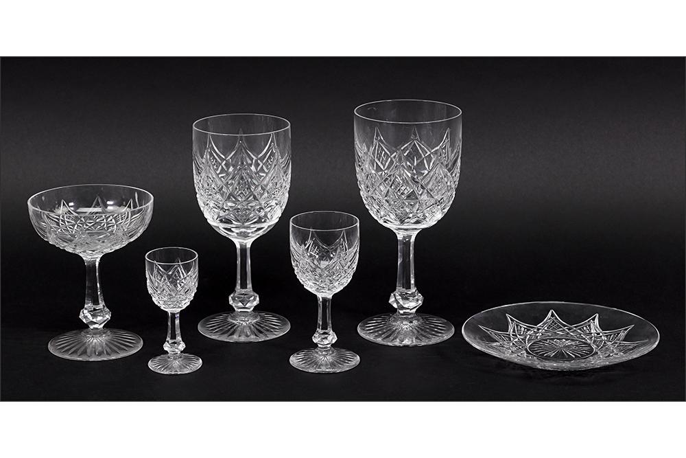 A Baccarat Crystal Partial Stemware Service.: A Baccarat Crystal Partial Stemware Service. Colbert pattern comprising four tall water goblets, six water goblets, four sherry goblets, six champagne / tall sherbet goblets, four cordials and six pla