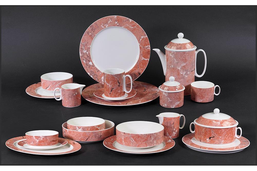 A Villeroy & Boch Partial Dinner Service in the Siena: A Villeroy & Boch Partial Dinner Service in the Siena Pattern. Comprising 12 dinner plates, 15 salad plates, 8 chargers, 12 soup/cereal bowls, 11 flat cups, 3 mugs, 11 saucers, 1 coffee pot with lid, 