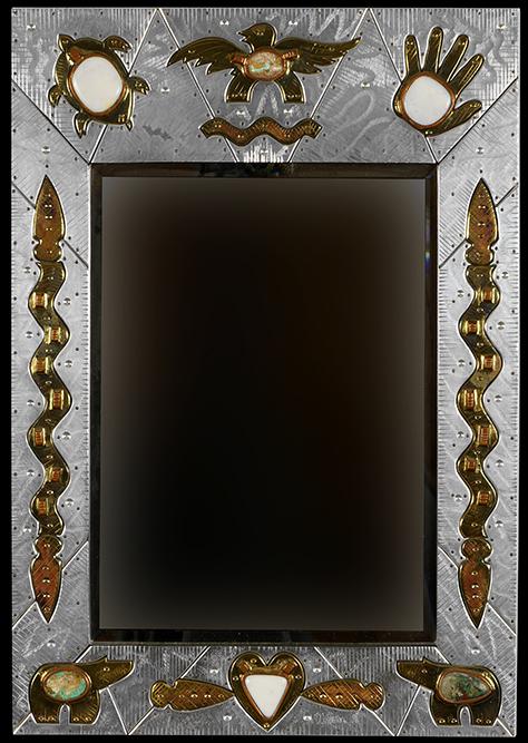 Thom Wheeler (American, B. 1946) Southwest Mirror.: Thom Wheeler (American, B. 1946) Southwest Mirror. Mirror with frame in engraved metal with brass, turquoise, and other stones, signed lower right and dated '96 Overall: 32" x 22 1/4"