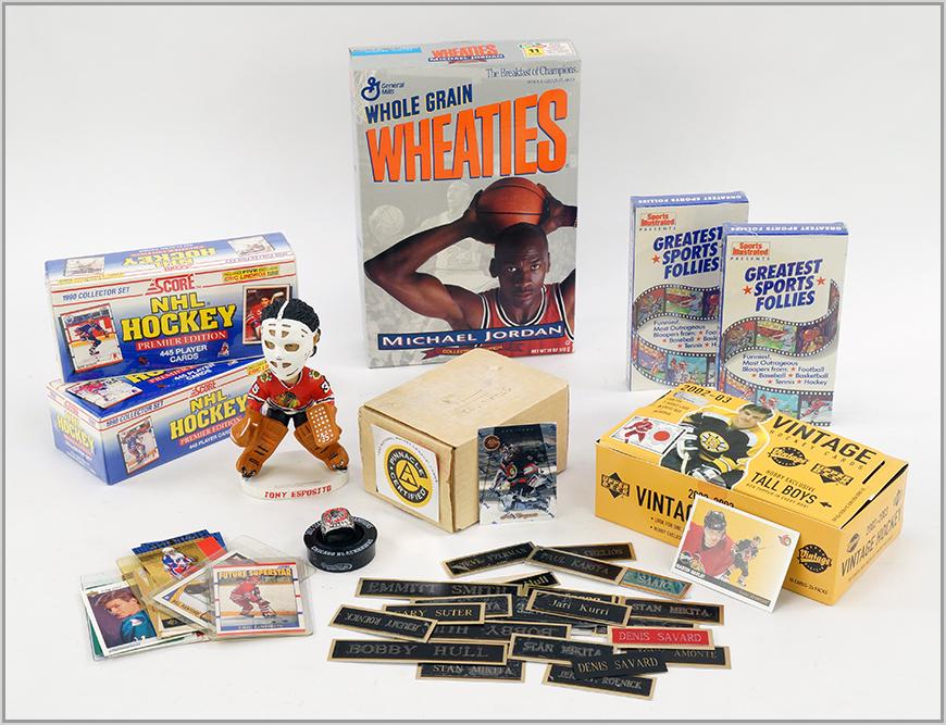 A Collection of Sports Memorabilia.: A Collection of Sports Memorabilia. Featuring the Michael Jordan Wheaties box, hockey cards, bobble head, videos and locker room tags