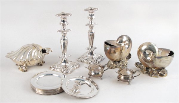 PAIR OF ATKINS BROTHERS SILVER SOLDERED SHELL F: PAIR OF ATKINS BROTHERS SILVER SOLDERED SHELL FORM SERVERS. Together with a pair of silverplate candlesticks, seven silverplate bread plates, two English silverplate covered salt cellars with cobalt g