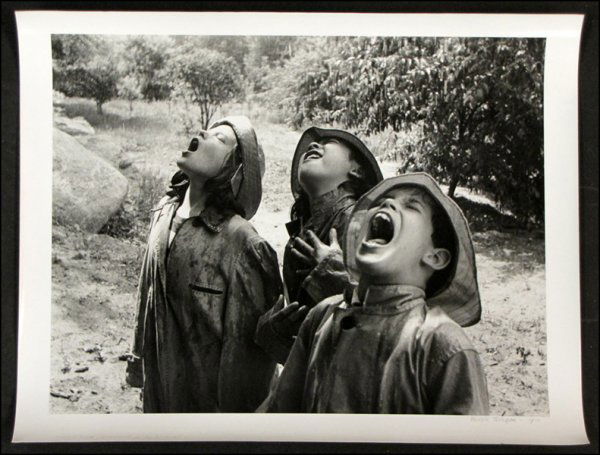 BARBARA MORGAN (AMERICAN 1900-1992) CHILDREN SI: BARBARA MORGAN (AMERICAN 1900-1992) CHILDREN SINGING IN THE RAIN. Gelatin silver print, 1950, printed in 1983; Signed, dated and titled in ink in the lower margin; Additionally signed, dated and title