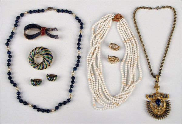 BOUCHER GREEN AND BLUE ENAMEL DEMI-PARURE.: BOUCHER GREEN AND BLUE ENAMEL DEMI-PARURE. Comprised of a brooch and paif of clip earrings. Together with a Ciner multi-strand necklace with a faux coral clasp, one pair of Ciner clip earrings, one Ci