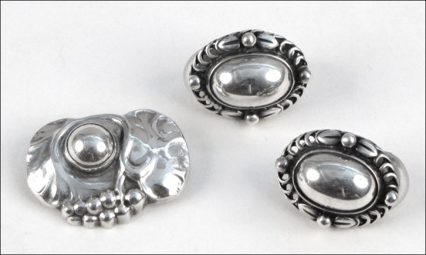 GEORG JENSEN STERLING SILVER BROOCH.: GEORG JENSEN STERLING SILVER BROOCH. Together with one pair of Georg Jensen 1995 sterling silver clip earrings