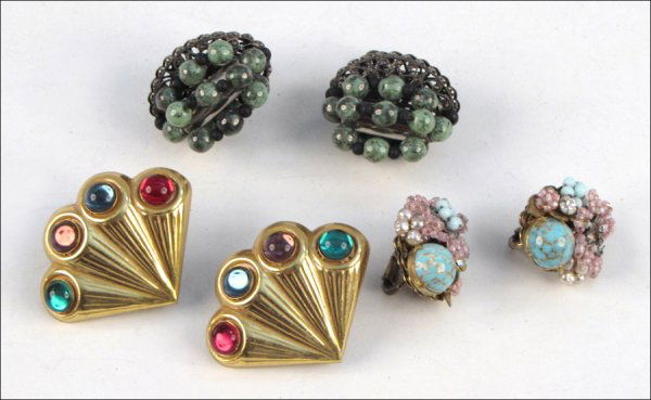 THREE PAIRS OF MIRIAM HASKELL EARCLIPS.: THREE PAIRS OF MIRIAM HASKELL EARCLIPS. Comprised of one pair of green and black bead screwback earclips, one pair of gold tone fan form multi-colored screwback earclips, and one pair of seed bead and