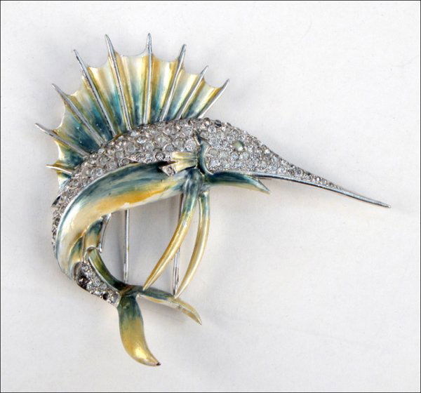 MARCEL BOUCHER WHITE RHINESTONE AND ENAMEL SAIL: MARCEL BOUCHER WHITE RHINESTONE AND ENAMEL SAILFISH FUR CLIP. Width: 3.25"