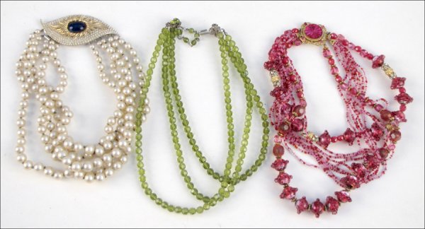HATTIE CARNEGIE PINK SEED BEAD, FACETED GLASS B: HATTIE CARNEGIE PINK SEED BEAD, FACETED GLASS BEAD, AND WHITE RHINESTONE MULTI-STRAND NECKLACE. Together with a Marvella five-trand faux pearl necklace with a white rhinestone and faux lapis clasp, an