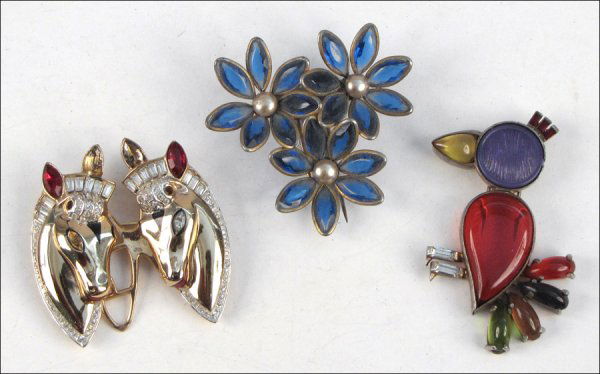 CORO STERLING VERMEIL, WHITE AND RED RHINESTONE: CORO STERLING VERMEIL, WHITE AND RED RHINESTONE HORSE DUETTE BROOCH/CLIP. Together with a blue glass and faux pearl fur clip, and a colored glass bird form clip