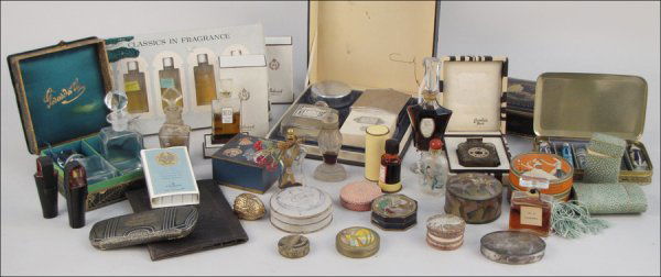 COLLECTION OF VINTAGE PERFUME BOTTLES AND ACCES: COLLECTION OF VINTAGE PERFUME BOTTLES AND ACCESSORIES. With examples by Coty, Mary Dunhill, Lilly Dache, Molinard, Guerlain, unmarked Lalique, and others