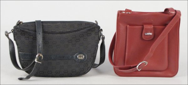 GUCCI BLACK MONOGRAMMED CANVAS AND LEATHER HAND: GUCCI BLACK MONOGRAMMED CANVAS AND LEATHER HANDBAG. Together with a Longchamp red leather handbag with dustbag