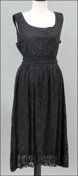 BILL BLASS BLACK LACE SLEEVELESS DRESS.: BILL BLASS BLACK LACE SLEEVELESS DRESS. With a gathered jersey waist line