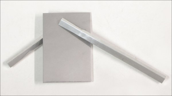 JOHN RAYMOND HENRY (AMERICAN, B.1943) UNTITLED.: JOHN RAYMOND HENRY (AMERICAN, B.1943) UNTITLED. Polished steel 12" x 22"