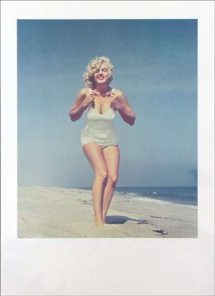 SAM SHAW (AMERICAN 1912-1999) MARILYN ON THE BE: SAM SHAW (AMERICAN 1912-1999) MARILYN ON THE BEACH. Color photograph, 1958, number 7 from portfolio B of The Joy of Marilyn, with Sam Shaw embossment stamp lower right and ink stamp on the reverse; Pu