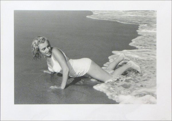 SAM SHAW (AMERICAN 1912-1999) MARILYN ON THE BE: SAM SHAW (AMERICAN 1912-1999) MARILYN ON THE BEACH, EAST HAMPTON, LONG ISLAND. Black and white photograph, 1958, number 21 from portfolio D of The Joy of Marilyn, with Sam Shaw embossment stamp lower