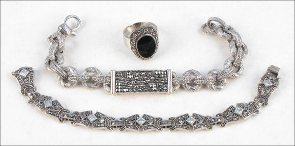 TWO JUDITH JACK MARCASITE AND STERLING SILVER B: TWO JUDITH JACK MARCASITE AND STERLING SILVER BRACELETS. Together with an onyx, marcasite, and sterling silver ring