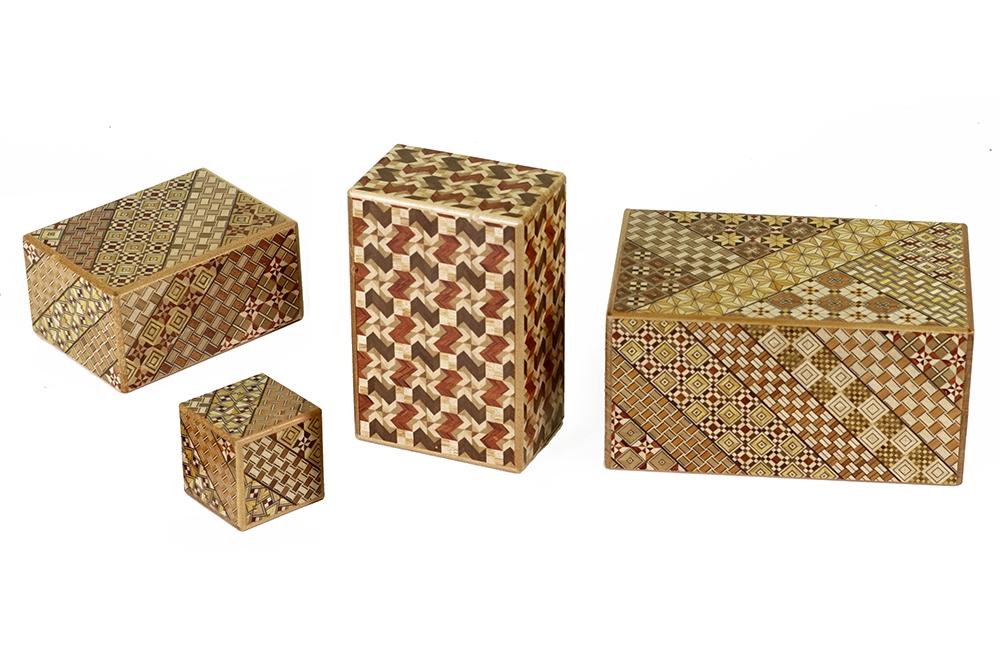 Four Japanese Mixed Inlay Wood Puzzle Boxes. (1 of 1)