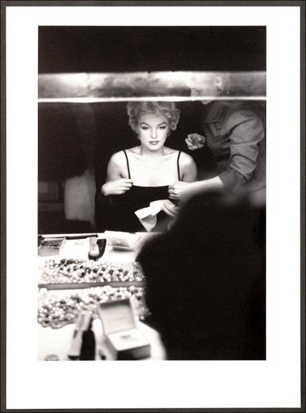 SAM SHAW (AMERICAN 1912-1999) MARILYN AT THE MA: SAM SHAW (AMERICAN 1912-1999) MARILYN AT THE MAKEUP TABLE. Black and white photograph, 1955, number 10 from portfolio B of The Joy of Marilyn, edtion 5/200, with Sam Shaw embossment stamp lower right