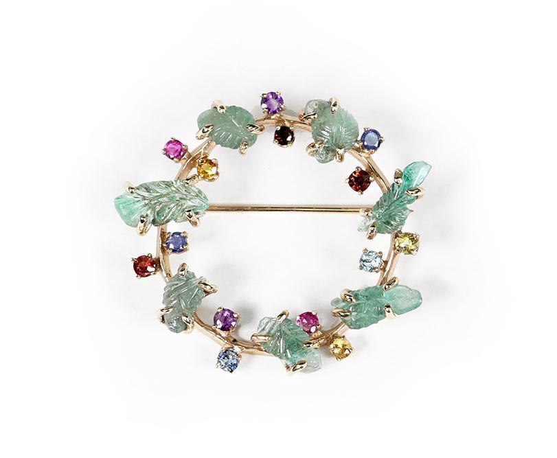 A Gem-Set Circle Brooch. (1 of 1)