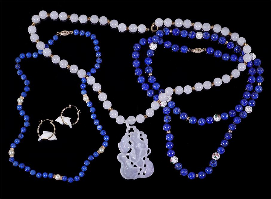 A Collection of Jewelry.: A Collection of Jewelry. Comprising a lapis, pearl and 14 karat gold necklace, a lapis, cloisonne and 14 karat yellow gold necklace, a pair of 14 karat yellow gold and mother-of-pearl hoop earrings an