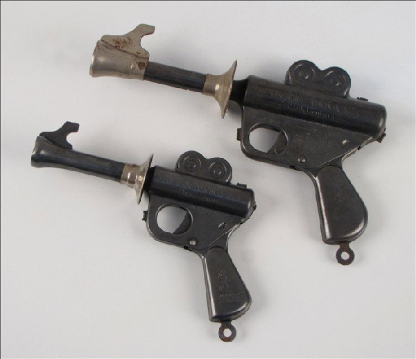 TWO BUCK ROGERS PISTOLS.: TWO BUCK ROGERS PISTOLS. Smaller pistol is believed to be the "Wilma" pistol. Both guns made by the Daisy Manufacturing Company Larger: 6.5" x 9.5" Smaller: 5.75" x 7"