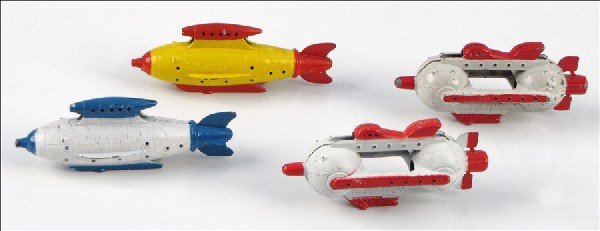 FOUR BUCK ROGERS TOOTSIETOY METAL TOYS.: FOUR BUCK ROGERS TOOTSIETOY METAL TOYS. Comprised of two Flash Blast Attack Ships, one red and yellow Venus Duo-Destroyer, and one blue and white Venus Duo-Destroyer