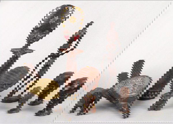 GROUP OF AFRICAN CARVED WOOD FIGURES.: GROUP OF AFRICAN CARVED WOOD FIGURES. Together with a bellows Tallest Figure Height: 21.5"