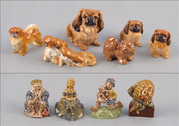 THREE ROYAL DOULTON PORCELAIN DOGS.: THREE ROYAL DOULTON PORCELAIN DOGS. Together with two Royal Worcester porcelain dogs, and four ceramic allegorical figures