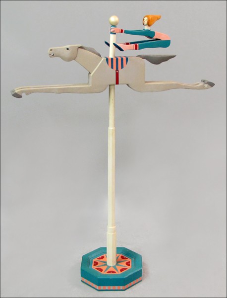 JAMES EATON (20TH CENTURY) WHIRLIGIG.: JAMES EATON (20TH CENTURY) WHIRLIGIG. Horse and Rider, painted wood Height: 56.50"