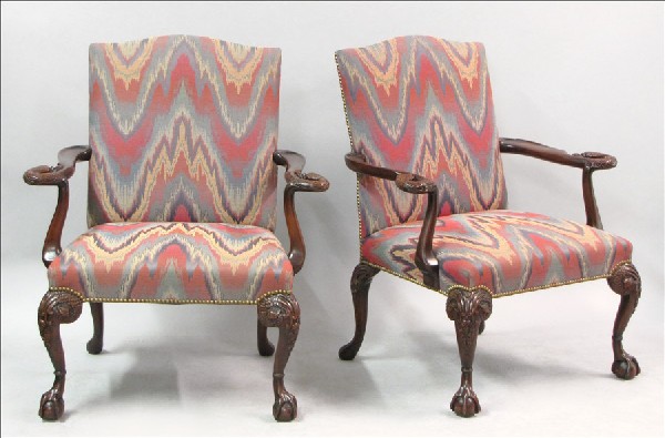 PAIR OF HOLLY HUNT CARVED MAHOGANY OPEN ARMCHAI: PAIR OF HOLLY HUNT CARVED MAHOGANY OPEN ARMCHAIRS.