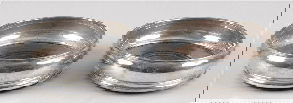 PAIR OF ENGLISH STERLING SILVER AND CARVED OAK: PAIR OF ENGLISH STERLING SILVER AND CARVED OAK WINE COASTERS. 1.75" x 5.5"