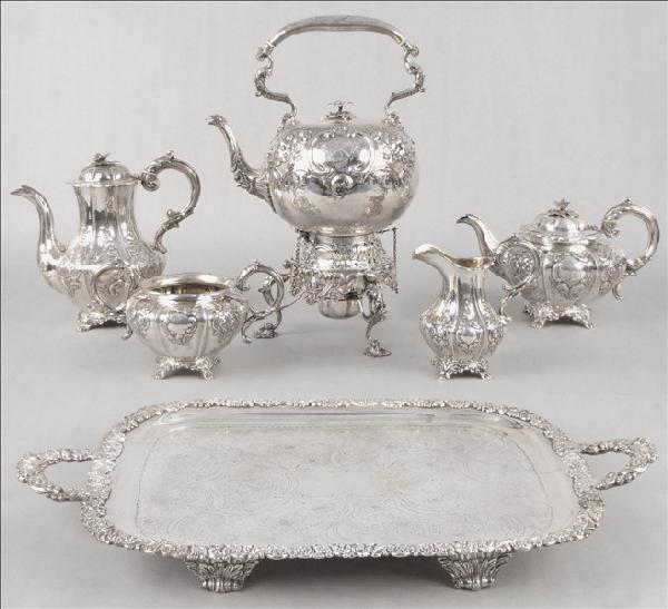 19TH CENTURY ENGLISH STERLING SILVER REPOUSSE T: 19TH CENTURY ENGLISH STERLING SILVER REPOUSSE TEA AND COFFEE SERVICE. Bearing the hallmarks of Samuel Hayne and Dudley Carter. Service comprised of one coffee pot, one teapot, one open sugar bowl, and