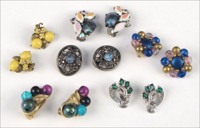 FIVE PAIRS OF SIGNED EARCLIPS.: FIVE PAIRS OF SIGNED EARCLIPS. Comprised of one pair of Napier silverplate and blue rhinestone earclips, one pair of Mazer green and white rhinestone earclips, one pair of Kramer multicolored bead ear
