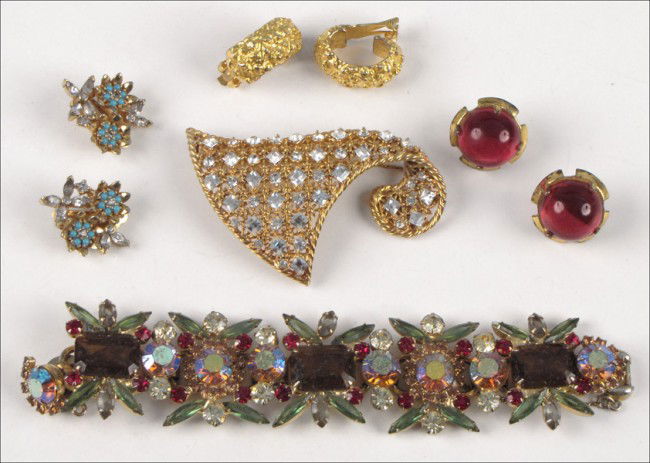 JULIANA MULTI-COLORED RHINESTONE BRACELET.: JULIANA MULTI-COLORED RHINESTONE BRACELET. Together with a pair of Nettie Rosenstein ruby glass earclips, a pair of Jomaz faux turquoise and rhinestone earclips, a pair of Kenneth Jay Lane gold tone e