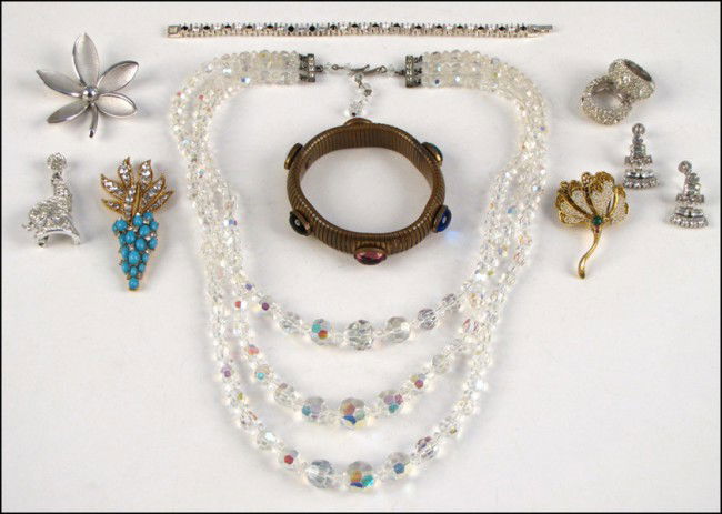 CINER WHITE RHINESTONE AND FAUX TURQUOISE BROOC: CINER WHITE RHINESTONE AND FAUX TURQUOISE BROOCH. Together with a BSK faux pearl floral brooch, a pair of Bogoff white rhinestone screwback earrings, a Hobe three-strand faceted crystal necklace, a pa